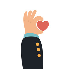 Hand holding a red heart