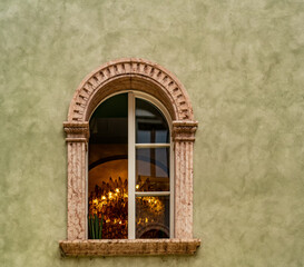 Elegant window on sage green wall background