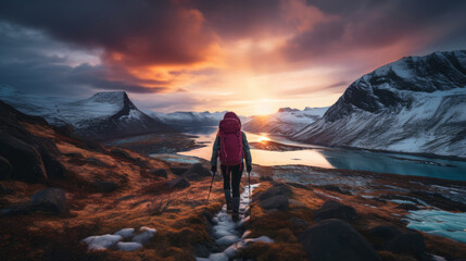 View of one backpacker walking up the mountain in beautiful remote arctic wilderness