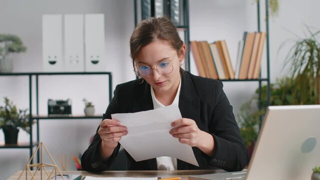 Caucasian business woman open envelope letter reading it. Career growth advance promotion bank loan approve, successful admission to monetary award, long-awaited invitation great news lottery game win