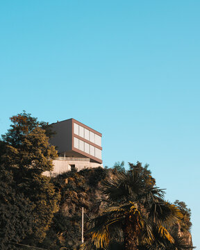 Modern Hilltop Villa: A Serene Retreat Amidst Italian Charm with a blue sky