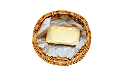 Loaf of bread with butter in a wicker basket isolated on a transparent background.