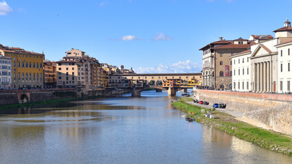 Florence, Italy - 15 Nov, 2022: Ponte Vecchio Bridge on the River Arno - obrazy, fototapety, plakaty