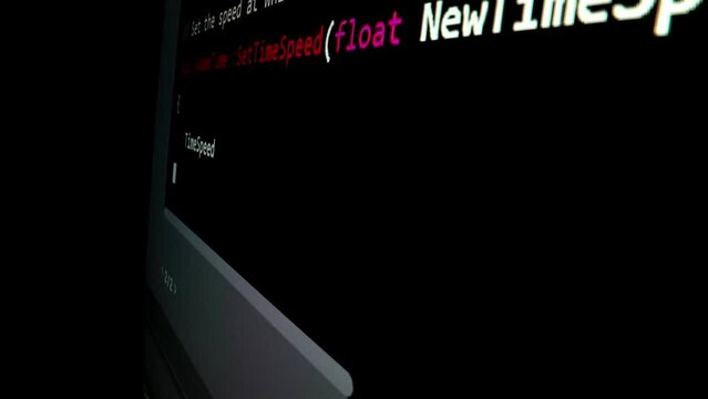 Closeup macro shot movement of coding script moving across LED screen with real-time AI-generated typing, showcasing advanced AI learning in optimization, debug and coding for software development.