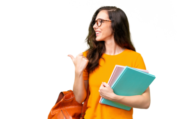 Young student caucasian woman over isolated background pointing to the side to present a product