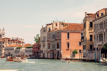 Fototapeta na wymiar Venice: One of The World's Most Touristic City Revealing the Beauty of the Grand Canal with Abundance of Boats and Colorful Buildings