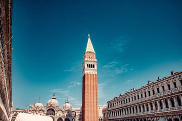 Vibrant Piazza San Marco in Venice, no people, offers a captivating blend of architectural...