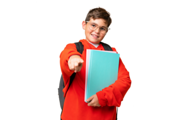 Little caucasian student kid over isolated chroma key background pointing front with happy expression