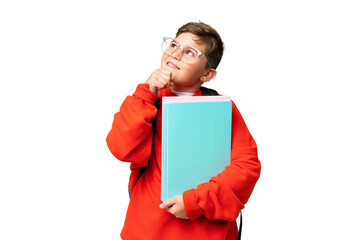 Little caucasian student kid over isolated chroma key background and looking up