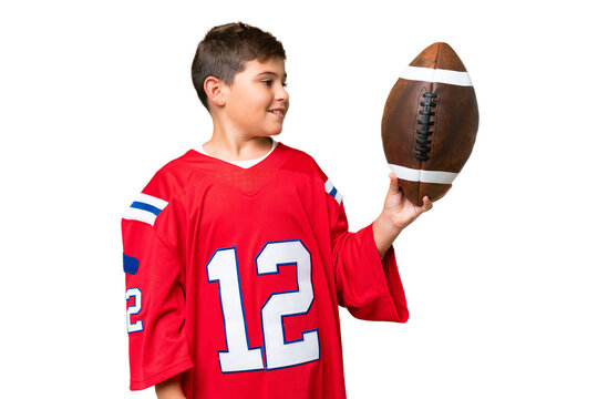 Little caucasian kid playing rugby over isolated chroma key background with happy expression - Powered by Adobe