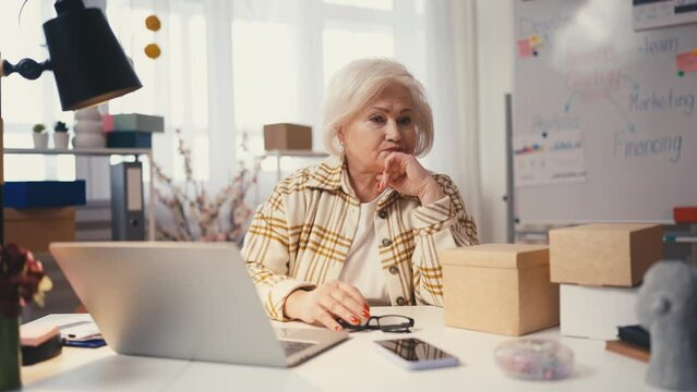 Upset businesswoman feeling unsatisfied with revenue report, decrease of sales