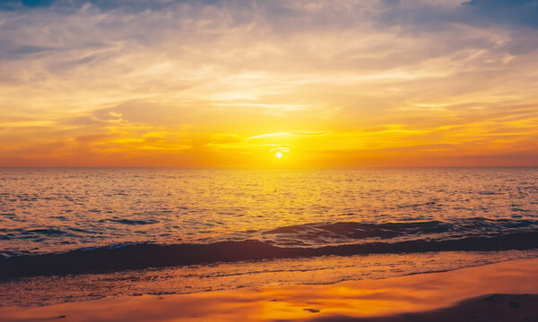 Beautiful sunset on the beach. Admirable landscape.