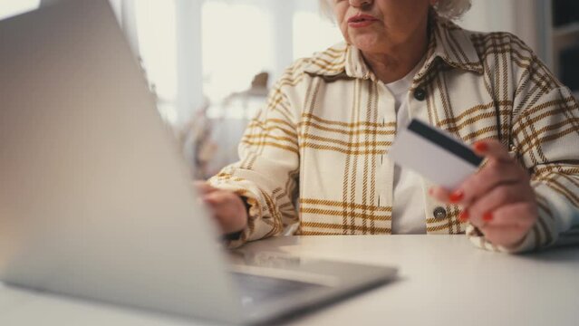 Senior woman having blocked credit card problem, financial scam, failed payment