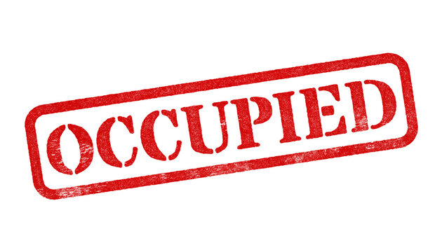 Occupied red rubber stamp isolated on transparent background with distressed texture effect