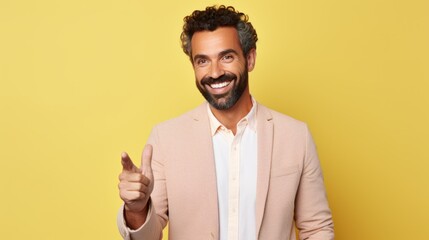 Portrait of a handsome confident man pointing with his finger isolated on a plain background. Generative AI illustration.