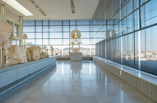Interior of The Acropolis Museum Displaying Various Original Marble Statues or Sculptures from the Acropolis and the Decorative Top of the Parthenon on May 26, 2023 in Athens, Greece