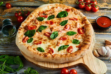 pizza with salami and tomatoes