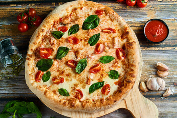 pizza on a wooden table