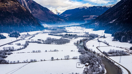 Fototapeta na wymiar Valle di Tures from above. Winter landscape
