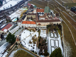 Novacella Abbey from above. Winter landscape