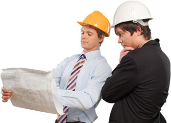 architect and supervisor Reviewing Blueprints