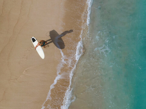 Aerial view of surfer at the beach