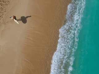 Aerial view of surfer at the beach - 616204016