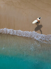 Aerial view of surfer at the beach - 616204296