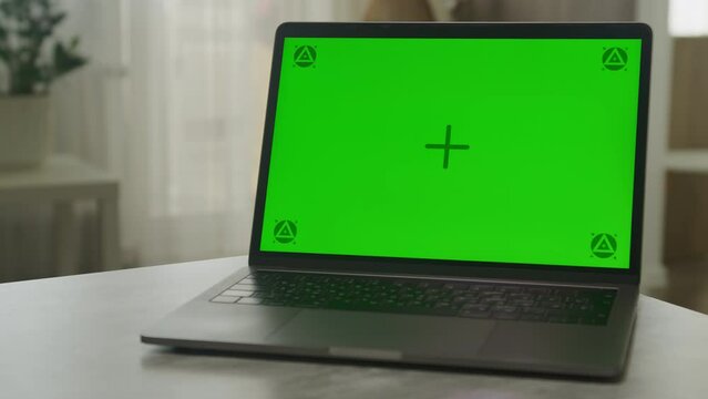 Orbiting Around Green Screen Laptop with Markers