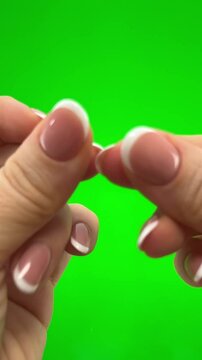 Two at the same time snap your fingers Close up. hand snapping hand gesture isolated on green background with copy space for place a text message for advertisement, and promote your brand and product