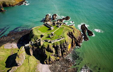 Dunnottar Castle Dun Fhoithear on North Sea coast south of Stonehaven, Scotland, Dates from early Middle Ages, surviving buildings 14th to 16th C - obrazy, fototapety, plakaty