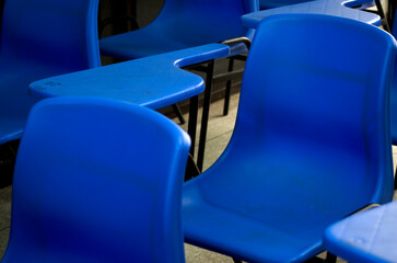 blue chairs in a row