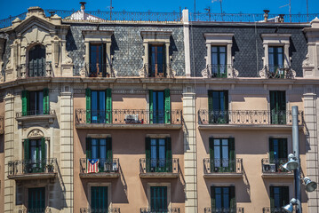 Fototapeta na wymiar Apartment house at Avenue of the Parallel in Barcelona city, Spain