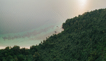 Aerial drone view of seascape scenery with at Tinggi Island or Pulau Tinggi in Mersing, Johor, Malaysia