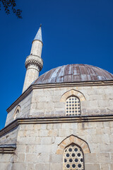 Fototapeta na wymiar Dome and minaret of Hajji Alija Mosque in Pocitelj village, Bosnia and Herzegovina