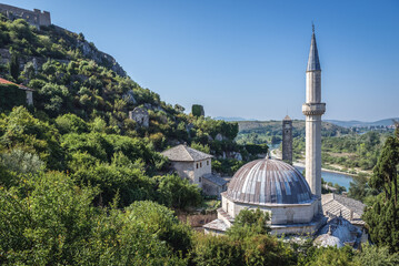 Naklejka premium Aerial view with Hajji Alija Mosque in Pocitelj historic village, Bosnia and Herzegovina