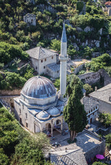 Naklejka premium Hajji Alija Mosque seen from Citadel in Pocitelj historic village, Bosnia and Herzegovina