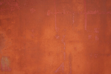 Rusty red abstract texture. A red and orange background.