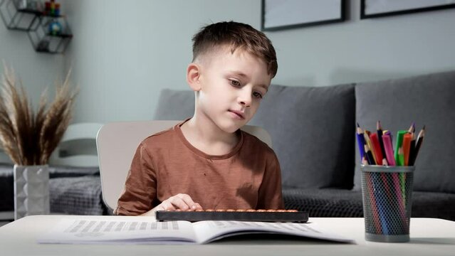 Little boy exhausted and tired of counting of mental arithmetic
