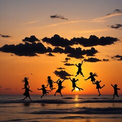Fototapeta na wymiar Silhouettes of children jumping in the air at sunset.