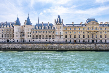 Fototapeta na wymiar The Conciergerie - former courthouse and prison at river Seine in Paris, France