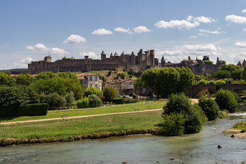 Fototapeta na wymiar Beautiful town of Carcassonne in Canal du Midi (France)