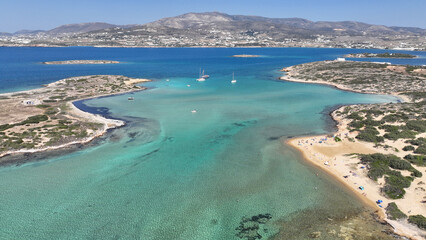 Aerial drone photo of paradise turquoise coloured nudist beach near camping of Northern part of Antiparos island, Cyclades, Greece