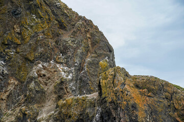 Cannon Beach along the Oregon Coast. Haystack Rock and the blues sky.