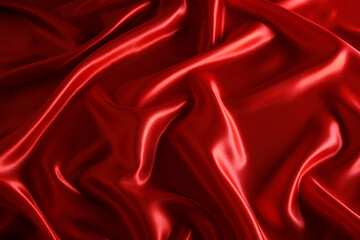 Obraz premium Abstract background made of red silk wavy fabric.