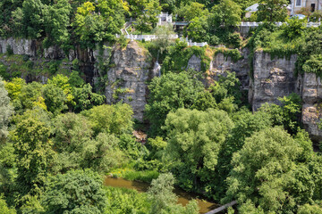 Smotrych river canyon with waterfall. Kamianets-Podilskyi, Ukraine.