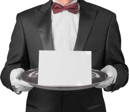 Man in elegance tuxedo suit with tie holds plate and card