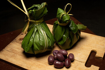 El Juane, a typical dish from the Peruvian jungle, prepared with rice and chicken wrapped in wild...