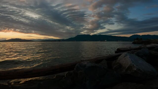 Jericho Beach during dramatic Sunset. Vancouver, British Columbia, Canada. Slow Motion Cinematic