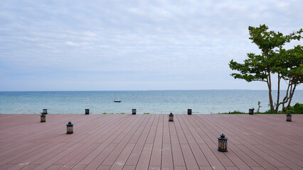wooden deck by the sea in a tropical resort 